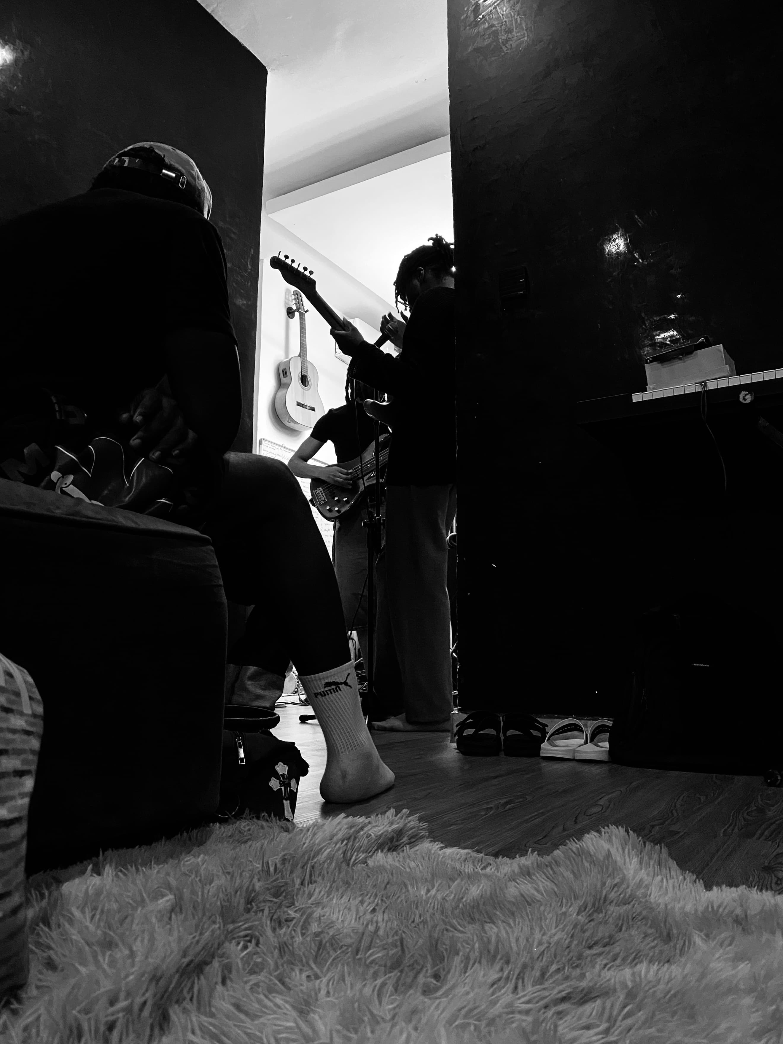 drunkgiantbird mid-rehearsal — guitars and amps in a low-lit studio